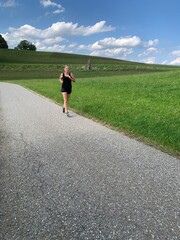 woman running outdoors 