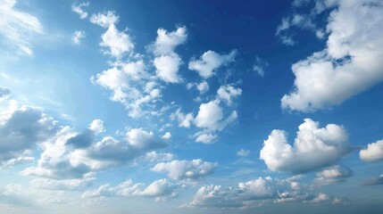 Bright blue sky with fluffy white clouds and clear copy space on the right for inspirational or promotional content