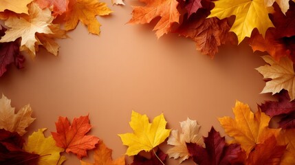 Warm autumn leaves pattern with vibrant yellow, orange, and brown colors and textured background, overhead shot with empty space on the left for design elements