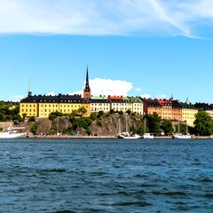 Obraz premium Panoramic view of colorful buildings along a waterfront