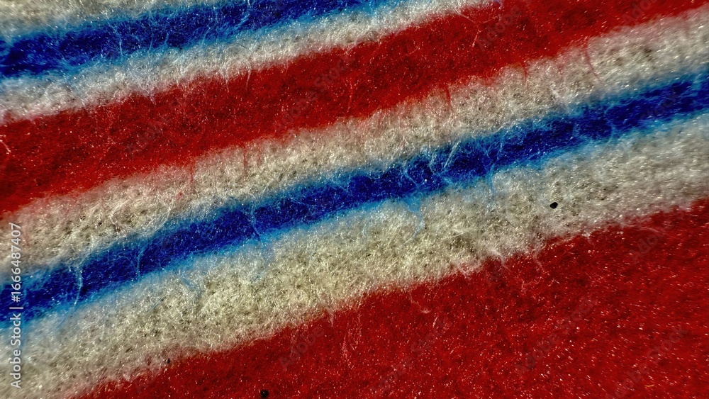 Poster vibrant close up of red blue and white fuzzy textile fiber texture with striped pattern perfect for 