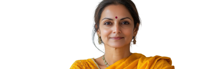 Elegant woman wearing traditional Indian attire, vibrant saffron saree, with warm expression, showcasing cultural beauty and confidence in portrait photography