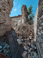 ruined street and destroyed houses the city war in Ukraine