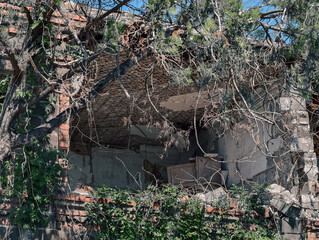 ruined street and destroyed houses the city war in Ukraine