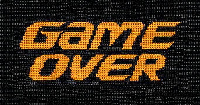 Retro game over message in pixelated orange text
