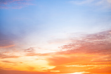 Beautiful , luxury soft gradient orange gold clouds and sunlight on the blue sky perfect for the background, take in evening,Twilight, Large size, high definition landscape photo