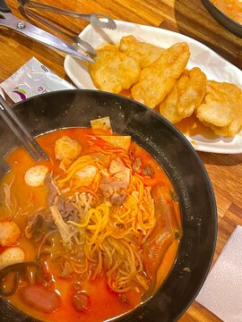 Spicy and numbing malatang with a mix of fresh ingredients in rich Sichuan broth, paired with crispy and tangy guobaorou. A perfect balance of bold heat and sweet-sour crunch for a Chinese feast.