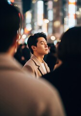 Serene Young Man Meditating Amidst Vibrant City Lights