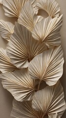 Close-up of beige paper palm leaves