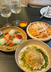 Creamy and rich spaghetti coated in a luscious white sauce, offering a smooth and savory flavor perfect for a comforting and satisfying meal.