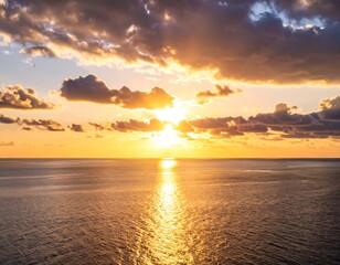 Fototapeta premium Golden sunset over calm ocean