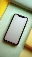 A sleek smartphone rests on a textured surface, its blank screen offering endless possibilities for communication, information, and connection. A minimalist aesthetic is shown.