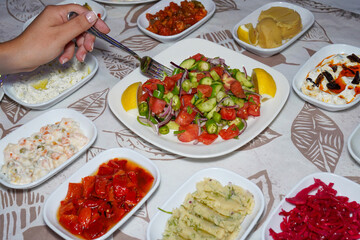Varieties of salads and appetizers on the table
