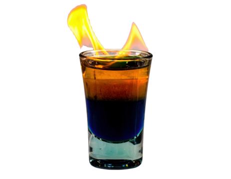 A vibrant shot of layered colored liquids in a glass with flames erupting from the top.