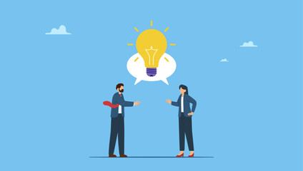 Businessman and businesswoman talking through speech bubble with lightbulb idea. Communicate idea in business discussion, effective communication to brainstorm and come up with solution or result.