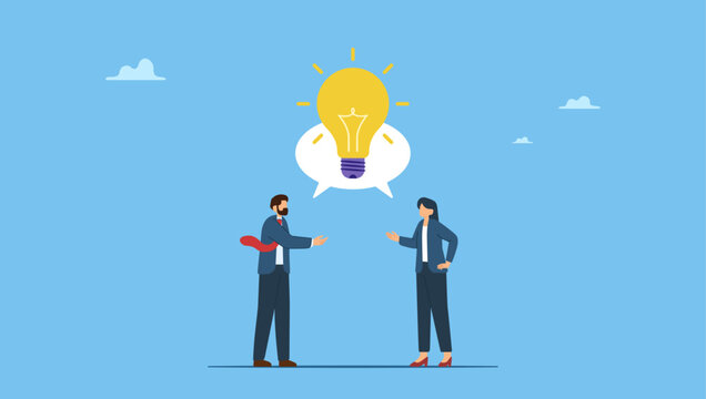 Businessman and businesswoman talking through speech bubble with lightbulb idea. Communicate idea in business discussion, effective communication to brainstorm and come up with solution or result.
