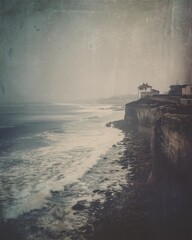 A tranquil coastal view featuring rugged cliffs and gentle waves. The soft, muted tones create a serene atmosphere, inviting viewers to experience the calming beauty of nature.