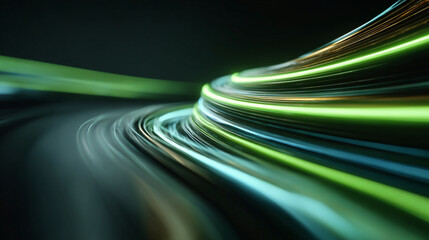 Abstract image of curved light trails in green and blue on dark background.