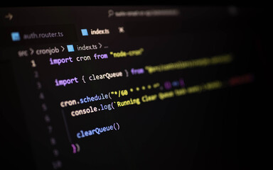 Close-up of JavaScript code using node-cron to schedule automated background tasks. Ideal for backend automation, server maintenance, and job scheduling in web apps.