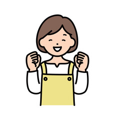 ガッツポーズをする主婦・エプロン姿の女性