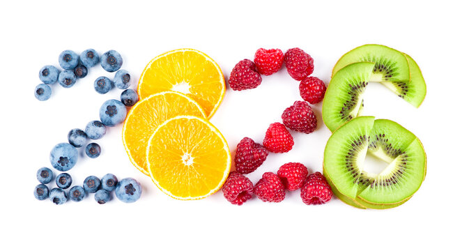 Mixed fruits. New year 2026 made of fruits on white background