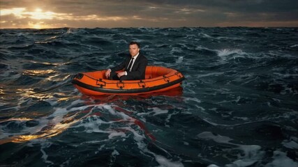Businessman in suit adrift on lifeboat in rough sea, concept of crisis, survival and uncertainty in business world
