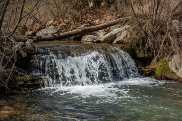 Obraz premium Waterfall and flowing stream