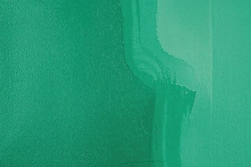 Abstract oil painting in green tones on canvas