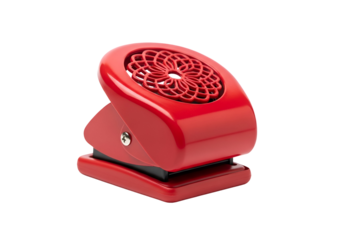 A vibrant red hole punch with a decorative flower-like pattern stands out against a black background.