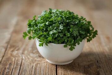 Fototapeta premium Close-up of green parsley in a dish on a wooden surface