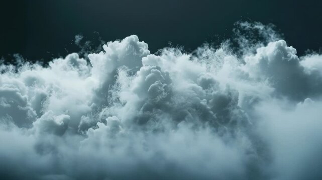 A plane flies through a cloudy sky with scattered clouds and blueish-gray hues