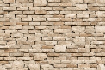 Obraz premium Beige stone surface with aged texture, rough brick faÃ§ade, digital tile pattern, natural stone backdrop