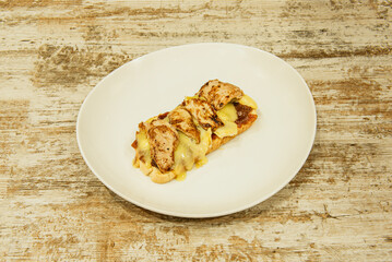 Grilled chicken sandwich with roasted red peppers and grilled eggplant, served on ciabatta bread with garlic mayonnaise