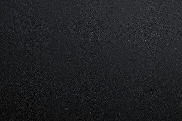 Obraz premium Dark rough surface, pavement