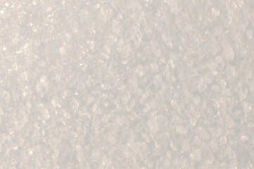 Obraz premium Close-up of natural snow texture on a wintry ground
