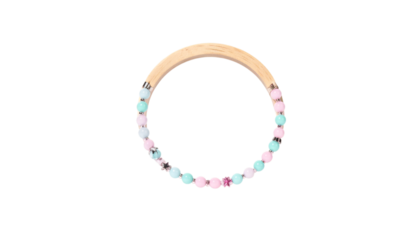 Pastel beaded teething ring, wooden handle on transparent background