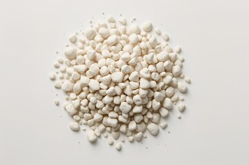 Natural mineral stone zeolite used as cat litter filler on white backdrop