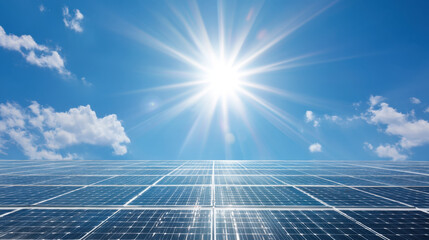 Bright sunlight shines over field of solar panels, reflecting clear blue sky with scattered clouds. This captures essence of renewable energy and sustainability