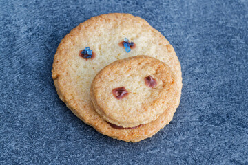 Round cookie decorated like pig face with chocolate nutella and crystals