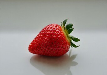 Bright red strawberries with a fresh texture, suitable for healthy food concepts, sweet fruit, and desserts.
