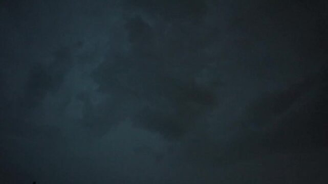 Lightning in the sky during rain in nature