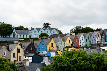 Colorful houses and scenic harbor views in Cobh
