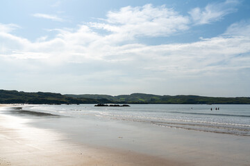 Famara Beach with waves and scenic coastline views