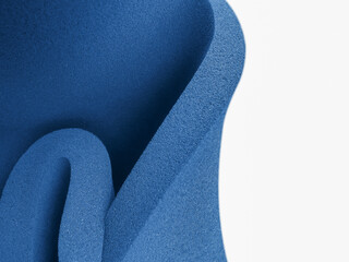 blue sponge foam roll isolated and with copy space. creative foam with simple composition
