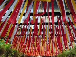 Multicolored ribbons hung over the walkway.