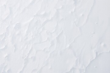 Obraz premium Overhead perspective of snowy surface pattern