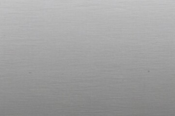 Background of stainless steel with a circular brushed finish