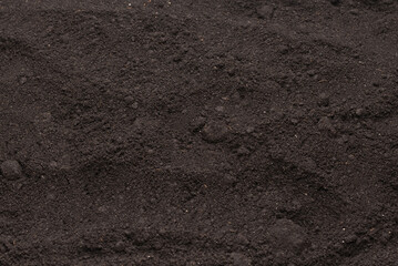 Black land for plant background. Top view.