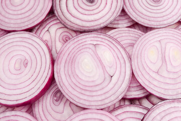 Onion slices as a background. Top view.