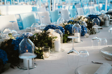 Elegant White and Blue Party Table with Candles